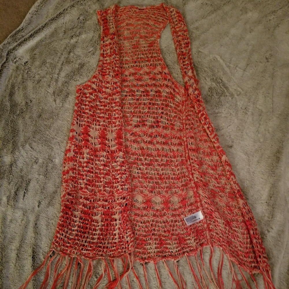 Sleeveless long, knit sweater